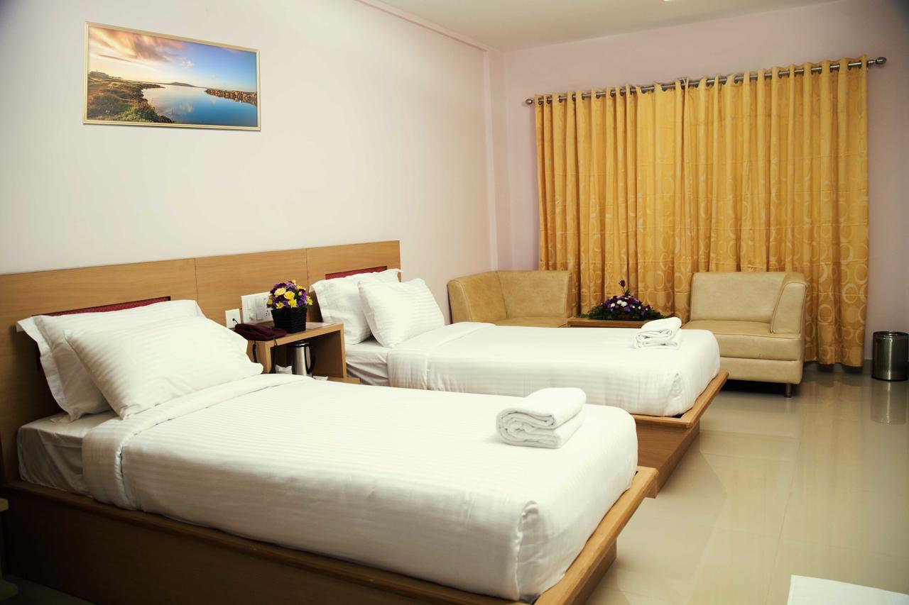 Hotel Rainbow Suites Kannur Exterior foto